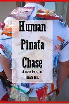 the back of a man's shirt that has candy on it and words reading human pinata chase