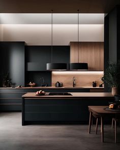 a modern kitchen with black cabinets and counter tops is seen in this image from the front view