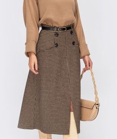 "Plaid jacquard midi-length skirt. Model with pockets, decorative buttons and front slit. Fastens with a hidden zipper. Fabric: 35% wool, 35% viscose, 30% polyester Skirts length 77 cm chest waist hip XS: 84cm 64cm 88cm (33\") (25\") (34.6\") S: 88cm 68cm 92cm (34.6\") (26.7\") (36.2\") M: 92cm 72cm 96cm (36.2\") (28.3\") (37.8\") L: 96cm 76cm 100cm (37.8\") (29.9\") (39.4\") XL: 100cm 80cm 104cm (39.4\") (31.5\") (40.9\") 2XL: 104cm 84cm 108cm (40.9\") (33.1\") (42.5\") 3XL: 108cm 88cm 112cm (4 Elegant Long Skirt Outfits, Brown Wool Skirt Outfit, Wool Skirt Outfit, Cozy Skirt, Warm Skirt, Warm Skirts, Office Clothing, Maxi Skirts Summer, Below The Knee Skirt