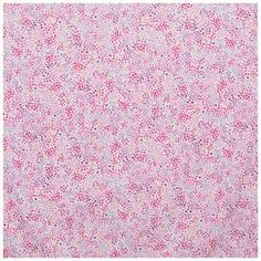 a pink and white wallpaper with small dots