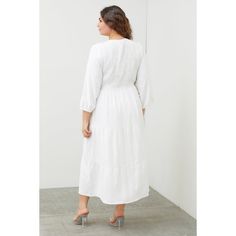 This comfortable and easy-to-wear maxi dress is perfect for a variety of occasions. The all-over smocking on top creates a flattering silhouette, while the three-quarter sleeves and tiered skirt provide a flowy look and feel. The dress is made from a stretchy fabric that is sure to keep you comfortable all day long, the waist band is stretchy as well. It also has pockets for added convenience! I love the textured look in the fabric and everyone can use a good white dress! The maxi length hits at the ankle for a chic and elongated look. The body of the dress is lined. Pair this dress with sandals for a breezy summer look, or add a denim jacket and booties for a stylish fall outfit. Polyester Hand wash cold, hang to dry Approximate size chart:Bust measurement taken from 1 inch below the arm Plus Size White, Stylish Fall Outfits, Top Skirt Set, Garden Of Eden, Black Midi Skirt, Denim Midi Skirt, Plus Size Skirts, Plus Size Maxi Dresses, Summer Look