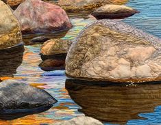 some rocks are in the water and there is no image here