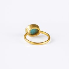 This beautiful stackable bezel set ring is made with oval faceted natural Sleeping Beauty Turquoise gemstone in 18K Vermeil Gold. The ring has a 925 stamp. Gemstone size is 8 x 12 mm. Please note that each turquoise stone is natural and can vary slightly in color and natural inclusions. This ring is available in two finishes: ✦ 18K VERMEIL GOLD ✦ ROSE GOLD ✦ BRIGHT STERLING SILVER This ring is great for stacking and we have it along with other ring designs available in a variety of stones. Pleas Turquoise Rings With Bezel Setting In Fine Jewelry Style, Gold Turquoise Ring With Gemstone, Gold Turquoise Ring With Bezel Setting For Gift, Turquoise Rings With Bezel Setting, Gold Stackable Turquoise Ring For Anniversary, Oval Turquoise Ring With Bezel Setting For Gift, Gold Turquoise Ring With Bezel Setting As Gift, Turquoise Gemstone Moonstone Ring, Turquoise Ring With Bezel Setting