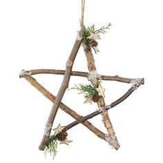 an ornament made out of sticks and branches with pine cones on the top