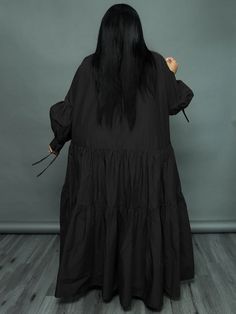 Material:90-95% Polyester & Spandex. Features:Plus size. long sleeve. button. ruffle. solid color. loose. maxi dress.Style: Casual Run Big. Order One Size Down Oversized Long Sleeve Black Maxi Dress, Oversized Solid Color Maxi Dress For Fall, Billowy Long Sleeve Casual Maxi Dress, Ruffled Maxi Dress For Winter, Winter Ruffled Maxi Dress, Winter Maxi Dress With Ruffles, Billowy Long Sleeve Maxi Dress With Ruffles, Oversized Long Sleeve Maxi Dress For Fall, Oversized Long Sleeve Maxi Dress For Winter