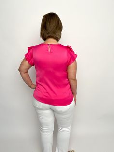 Upgrade your fashion with our Pink Satin Ruffle Sleeve Top! Made from luxurious pink satin-like material, this top features stunning ruffled sleeves that add a touch of elegance and femininity. Perfect for any occasion, this top will make you feel confident and stylish with its sophisticated look. Satin like fabric Round neck Ruffle tulip cap sleeves Back keyhole button closure Available S-2X True to size Modeled in size small Free shipping over $100. Feminine Satin Tops For Work, Feminine Satin Tops For Workwear, Spring Satin Short Sleeve Tops, Elegant Tops With Ruffles And Butterfly Sleeves, Elegant Stretch Tops With Flutter Sleeves, Elegant Fitted Top With Butterfly Sleeves, Feminine Tops With Butterfly Sleeves For Work, Elegant Fitted Tops With Butterfly Sleeves, Elegant Pink Stretch Top