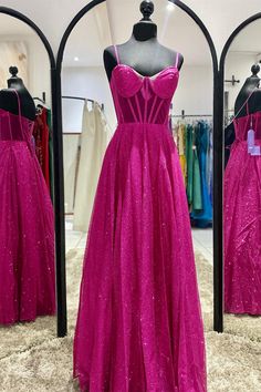 The fuchsia A-line long formal dress features spaghetti straps, a corset bodice, and a full-length skirt. SKU: 3119 Material: Tulle Spaghetti straps Corset bodice A-line silhouette Lace-up back Full length Ship in 7-10 business days Size: US 2-16. We offer free returns in 7 days. Please refer to our return policy page for more details. If you have any questions, don't hesitate to contact us: at service@dressesforparty.com. Pink A-line Evening Dress With Fitted Bodice, Pink A-line Ball Gown With Fitted Bodice, Pink Corset Dress For Gala During Prom Season, Pink A-line Ball Gown For Party, Prom Ball Gown With Fitted Bodice And Spaghetti Straps, Prom Ball Gown With Spaghetti Straps And Fitted Bodice, Fitted Ball Gown With Spaghetti Straps For Prom, Spaghetti Strap Ball Gown With Fitted Bodice For Prom, Fitted Spaghetti Strap Ball Gown For Prom