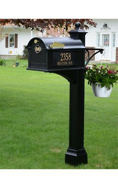 a mailbox in the middle of a lawn