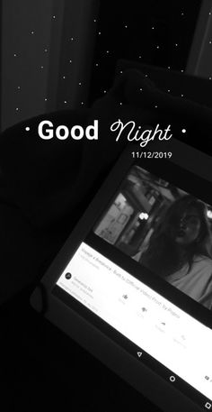 a person holding up a tablet computer in their hand with the words good night on it