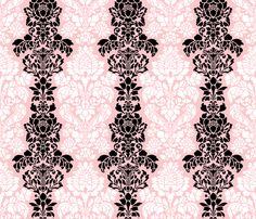 an ornate pink and black wallpaper pattern