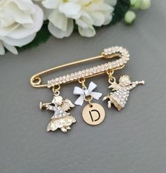 Alert‼️ Due to the global pandemic there may be a delay in delivery. Hoping for your understanding and patience. Stay safe and well!Baptism gift, Guardian Angel Pin Brooch, Gold Angel jewelry, Baby Shower Gift, Gift for Her.This is a beautiful angels pin brooch personalized with initial letter, decorated with angels blowing to trumpets.18k gold plated, 5.5cm longPlease leave the personalization details in the "Note to Seller" box as you proceed through the checkout process.This makes a beautiful Personalized Gold Brooches As Gifts, Personalized White Pins For Gifts, Christening Gifts For Boys, Newborn Baby Girl Gifts, Angel Pin, Beautiful Angels, Godparent Gifts, Angel Jewelry, Gold Angel