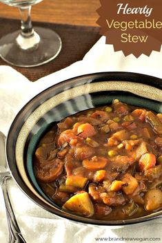 a bowl of hearty vegetable stew on a table