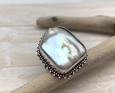 Hi everyone, just wanted to let you know we are open and shipping daily. Freeform Pearl Silver Bead Ring // Freeform Pearl Statement Silver Ring // Beaded Square Silver Ring // Japanese Pearl // 925 Silver Size 7 Height: 23mm Weight: 12 grams Origin: South Sea Pearl Bohemian Silver Beaded Rings, Silver Beaded Rings For Anniversary, Silver Beaded Rings For Gift, Beaded Square, Japanese Pearls, Turquoise Ring Silver, Sea Pearl, Green Opal, Silver Prices