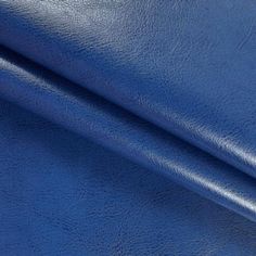 blue leather textured up close to the surface