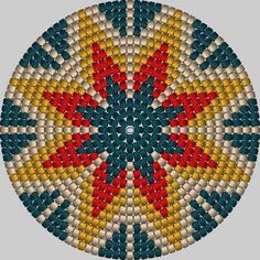 a circular beaded design with red, yellow and blue colors on it's surface