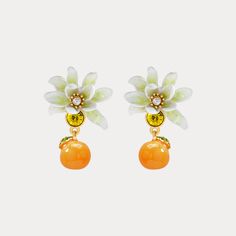 Orange Flower Stud Earrings are a trending earrings design among nature jewelry. They have enamel paint flowers and orange pendants. These fancy earrings come from Selenichast jewelry store. Elegant Orange Spring Jewelry, Elegant Orange Jewelry For Spring, Orange Flower-shaped Earrings For Gift, Orange Drop Earrings For Spring, Elegant Orange Flower Earrings, Orange Earrings For Spring Gift, Spring Gift Orange Earrings, Spring Flower Enamel Earrings, Orange Flower Earrings For Spring