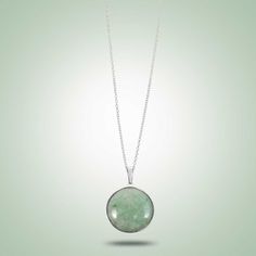 Sleek and elegant circle pendant, enhanced simplistically by a silver bezel. Mint Green Jade Sterling Silver (925) Length Pendant: 1.1" Length Chain: 18" Available in different Jade colors, on request Modern Round Cabochon Necklace, Modern Cabochon Necklace, Minimalist Round Cabochon Necklaces, Minimalist Round Cabochon Necklace, Sterling Silver Necklace With Large Circular Pendant, Sterling Silver Circular Necklace With Large Pendant, Sterling Silver Circle Necklace With Large Pendant, Sterling Silver Cabochon Round Necklace, Sterling Silver Round Cabochon Necklace