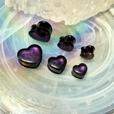 WELCOME TO PINK ALIEN BABE  YOUR ONE STOP SHOP FOR ALL THE CUTEST PLUGS AND ACCESSORIES IN THE GALAXY 🪐⭐️ 🎀This is a listing for A PAIR (two pieces) of Andromedan Love heart shaped purple glitter filled black ear plugs gauges in your choice of size. 👽💕 Sizes available: 0g 8mm, 00g 10mm, 1/2" 12mm, 9/16" 14mm, 5/8" 16mm, 3/4" 19mm, 7/8" 22mm, 1" 25mm, 28mm, 30mm 👽💕 Looking for more acrylic styles? https://www.etsy.com/shop/pinkalienbabe/?etsrc=sdt§ion_id=23195545 🌈💖 Your new gauges will c Pink Alien, Earrings Hearts, Love Dark, Piercing Inspo, Glitter Earrings, Gauged Earrings, Plugs Earrings, Gauges Plugs, Glitter Hearts