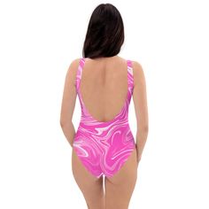 This one-piece swimsuit for all figures will bring out your best features. Enjoy the smooth fabric and the flattering design, and show it off by the sea or pool! • 82% Polyester, 18% Spandex • Fabric weight: 6.78 oz/yd² (230 g/m²), weight may vary by 5% • Chlorine-resistant fabric • Cheeky fit with a scoop neckline and a low scoop back • Zig-zag stitching • Double-layer front • Four-way stretch material stretches and recovers on the cross and lengthwise grainsSize guide CHEST (inches) WAIST (inc Trendy Stretch Swimwear For Swimming, Beachy One-piece Bodysuit With Lined Body, Beachy One-piece Bodysuit, Beachy Lined Swimwear For Poolside, Pink Swim Dress For Beach Season Swimming, Pink Swim Dress For Beach Season, Trendy One-piece Stretch Swimwear, Fitted One-piece Lined Swimwear, Beachy One-piece Fitted Tankini