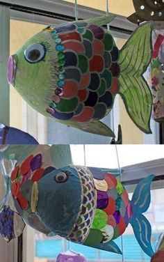 two pictures of colorful fish hanging from the ceiling