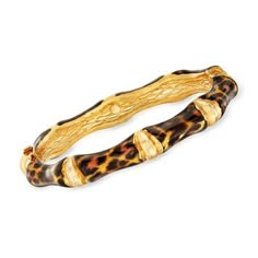 Ross-Simons - Italian Leopard-Print Enamel Bamboo-Style Bangle Bracelet Over Sterling. 7". Show your wild side with this on-trend bracelet. Crafted in Italy, the easy-to-wear bangle boasts a bamboo design with leopard-print enamel in polished 18kt yellow gold over sterling silver. Figure 8 safety. Hinged, leopard-print enamel bangle bracelet. Twisted Bangle, Trending Bracelets, Glass Drop Earrings, Bamboo Design, Enamel Bangle, Printed Jewelry, Natural Gold, Beaded Drop Earrings, Figure 8