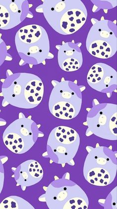 purple and white cows on a purple background