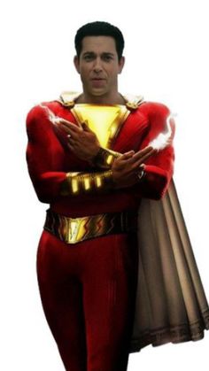 a man in a red and gold costume with his arms crossed, standing against a white background