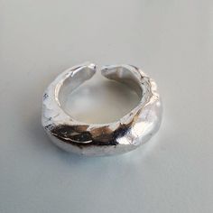 WELCOME to My Gallery, where you can find, handmade contemporary art jewelry, for you and your loved one -Dome ring -Textured Ring -Statement ring, cute Ring -Handmade Rings -Solid Silver -Carved out of wax, no two rings are alike, and the outcome is a unique organic form. -High-Quality Solid 925 Sterling Silver -Polished finish -Custom made - Men and women ring - Pinky ring 💍 Ring size conversion chart can be found in the picture section 💍 -Ring for both everyday wear and special occasions -M Modern Handmade Sterling Silver Midi Rings, Handmade Modern Sterling Silver Midi Rings, Minimalist Hand Cast Ring, Modern Handmade Stackable Rings As Gift, Minimalist Hand Cast Rings As A Gift, Minimalist Hand Cast Rings For Gift, Minimalist Hand Cast Rings As Gift, Minimalist Hand Cast Promise Ring, Modern Handmade Silver Midi Rings