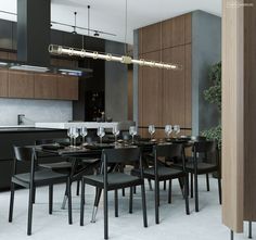 a dining room table and chairs with wine glasses on it