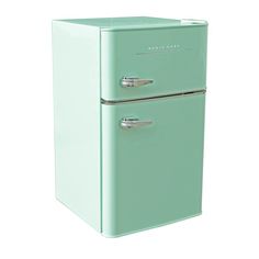 a mint green refrigerator freezer sitting on top of a white floor next to a wall