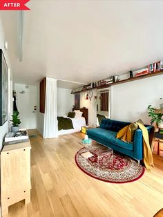 a living room filled with furniture and a flat screen tv on top of a hard wood floor