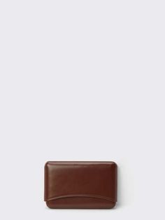 This card holder is an essential part of lemaire’s accessory collection. crafted from carefully tanned leather with a compact and smooth grain it is created using a meticulous technique that results in distinct pieces that are attuned to the intricacies of the human hand. the holder consists of two molded shapes that fit seamlessly together without the need for a closure system. its construction is seamless and unlined with creases that provide extra durability. each piece is hand-polished and w Four Horsemen, Human Hand, Natural Forms, Painting Edges, Pocket Bag, Wallet Men, Wallet Case, Grain, Card Holder