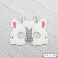 *Please read entire listing* These masks are great for Halloween, party favors, or just to pretend play around the house!!  *Mask Information* This listing is for 1 (one) Goat Mask.  Comes with rivets attached, to make it a little more durable. Comes with round elastic cord cut to roughly 16-20 inches long, so you can cut the elastic to fit more comfortably on your child. Masks are roughly 5x7, depending on the design ordered. Please note: Most of the designs can fit a child up to 10. However, w Fun Halloween Birthday Party Supplies, Fun Costume Accessories For Costume Party, Fun Halloween Costume Accessories For Carnival, Fun Carnival Costumes For Costume Party, Fun Carnival Halloween Costume Accessories, Fun Halloween Carnival Costume Accessories, Cute Halloween Costume Accessories, Cute White Party Costumes, White Themed Party Costumes