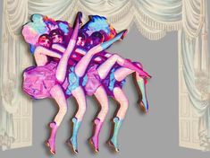 an image of three women dancing in the air with their arms around each other on stage