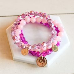 These bracelets are exclusively available for the month of April. Inspirational Pink Round Beads Jewelry, Inspirational Pink Beaded Jewelry, Pink Bracelets, Month Of April, Pink Jade, Jade Bracelet, Custom Glass, Glass Beaded Bracelets, Pink Bracelet