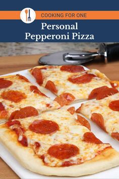 the personal pepperoni pizza is cut into four pieces and ready to be served on the table