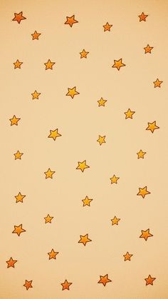 an orange and yellow wall with stars on it