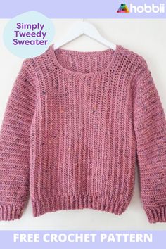 a pink sweater hanging on a hanger with the text simply tweedy sweater free crochet pattern