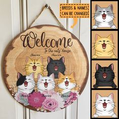 a wooden sign that says welcome to the cat house with four different cats on it