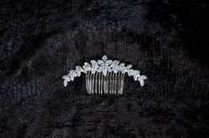 Make your wedding day unforgettable with our stunning bridal Hair Comb, designed to add elegance and sparkle to your bridal look ✨ This luxury headpiece features: 💎 HIGH QUALITY AAA ZIRCONIA CRYSTALS 💎  Each crystal mimics the brilliance of real diamonds, offering a radiant sparkle that catches every light.   🎀 DETAILS 🎀 Our bridal hair accessory has a 1 ⅛" metal comb, measures approximately 3.2 inches in width, and is plated in genuine silver platinum. Our hair accessories are free of Lead, Nickel, and Cadmium. 💫 VERSATILE STYLING 💫  This hair comb is perfect for updos, a pinned back look, side parts, or any bridal hairstyle.   Why brides love it:   ✨ Guaranteed to add sparkle and sophistication to your wedding look.   ✨ Crafted with care to ensure every detail is perfect.   ✨ Elega Diamond Hair, Bridal Hair Accessory, Hair Comb Accessories, Bridal Elegance, Metal Comb, Bridal Look, Hair Combs, Luxury Bridal, Bridal Hair Comb