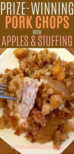 a white plate topped with apples and stuffing next to a fork on top of a wooden table