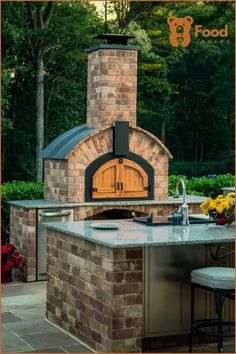 an outdoor brick pizza oven in the middle of a patio