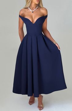 The epitome of elegance, Lanetta features a plunge bardot neckline with elasticated back strap bringing stylish flair. Falling to an effortlessly chic midi length, the design has a full, box pleated skirt and looks amazing paired with pointed heels and soft glam. 



Colour: Navy.

Premium non-stretch crepe.

Fully lined.

Plunge bardot neckline.

Shaped underbust seam.

Full, box pleated skirt.

Elasticated back strap.

Invisible zipper fastening.

Midi length.

 Size: XS, S, M, L, XL, XXL Box Pleated Skirt, Split Long Dress, Bardot Neckline, Box Pleat Skirt, Vest Blouse, Loungewear Dresses, Maxi Dress Sale, Soft Glam, Pointed Heels