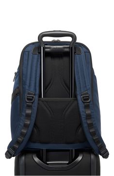 Modern and versatile, this spacious backpack outfitted with plenty of pockets is made from ballistic nylon for lasting durability. 16 1/2"H x 11"W x 6 1/2"D. (Interior capacity: large.) Top carry handle; adjustable backpack straps Padded compartment fits most 15" laptops Key leash Luggage sleeve This bag includes Tumi Tracer®, an exclusive, complimentary program that helps reunite lost or stolen bags with their rightful owners using a one-of-a-kind 20-digit number affixed to the bag Ballistic ny Nylon Backpack With Multiple Pockets For Trip, Nylon Backpack Luggage With Functional Pockets, Nylon Backpack With Functional Pockets, Functional Nylon Backpack For Business Trips, Nylon Business Backpack, Business Nylon Backpack Luggage, Backpack Outfit, Gift Kit, Diy Kits Gift