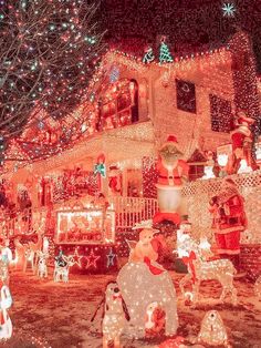 a house covered in christmas lights and decorations