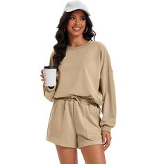 Oversized sweatsuit can be worn in various ways for trendy and cute look. This set for women in various colors, with many sizes to choose from, suitable for various body types, plus size ladies also can wear. Airplane travel outfit featuring a cozy sweatshirt and comfy shorts for a laid-back look. Sweater shorts sets are ideal for everyday wear, workouts, yoga sessions, or even as sleepwear. Airplane Travel Outfits, Sweater Shorts, Workouts Yoga, Shorts Sets, Women's Outfits, Airplane Travel, Comfy Shorts, Womens Fleece, Cozy Sweatshirts