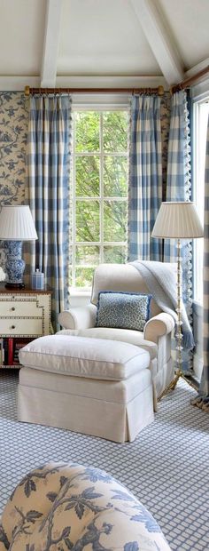 a living room with blue and white decor