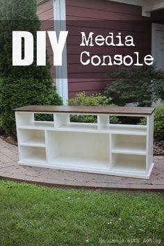 a diy media console is sitting in front of a house with text overlay that reads diy media console