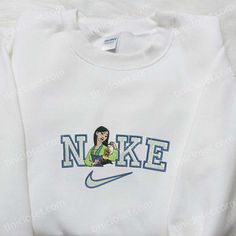 Mulan x Nike Embroidered Sweatshirt, Mulan Disney Embroidered Shirt, Best Gift Ideas Embroidered Nike Crewnecks, Nike Embroidered Sweatshirt, Nike Cartoon, Disney Character Shirts, Nike Inspired, Nike Sweatshirt, Shirt Embroidery, Nike Sweatshirts, Inspirational Celebrities