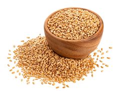 sesame seeds in a wooden bowl on white background